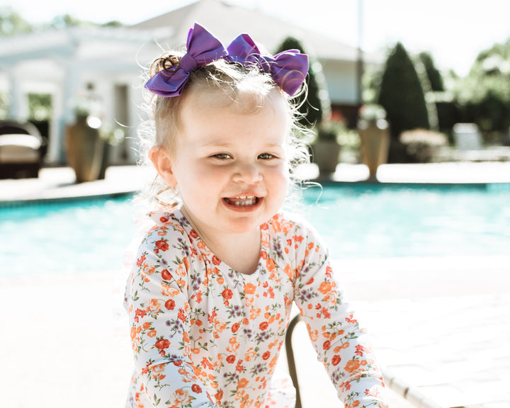 "party" purple swim bow  StevieJs